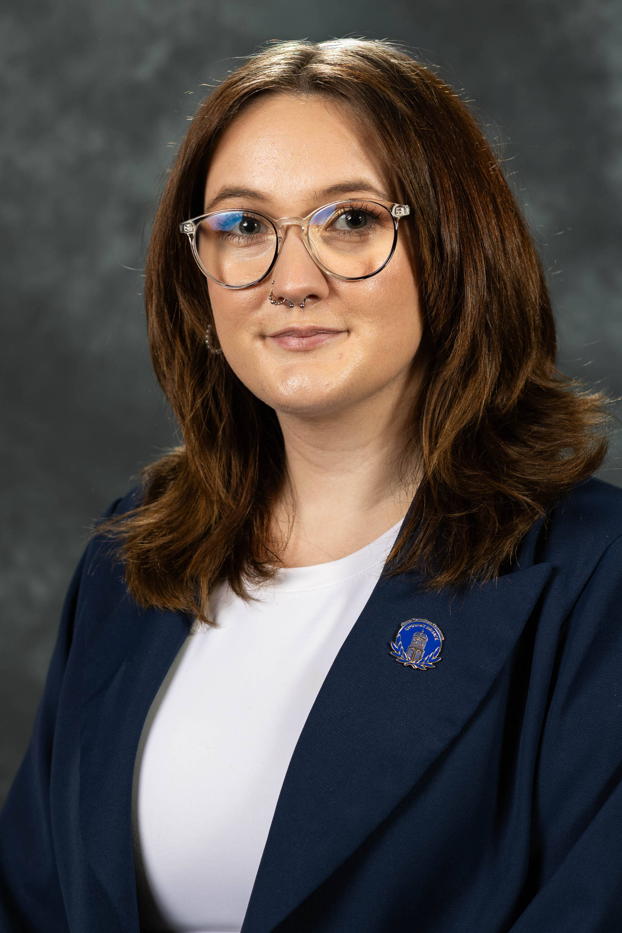 Cera McDonough in a blue suit.